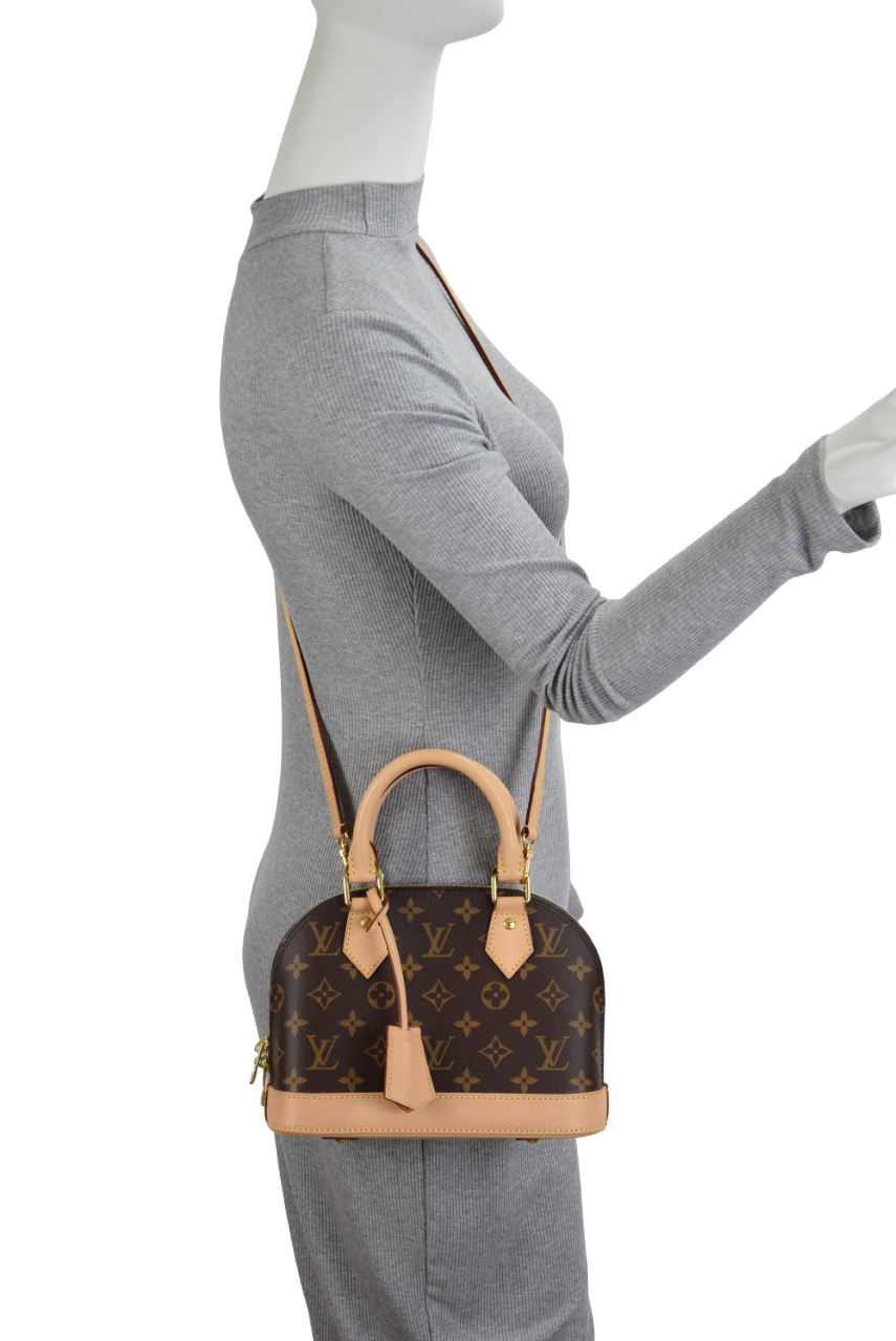Styled editorial visualization featuring Louis Vuitton Silk Tech Alma Shoulder Bag